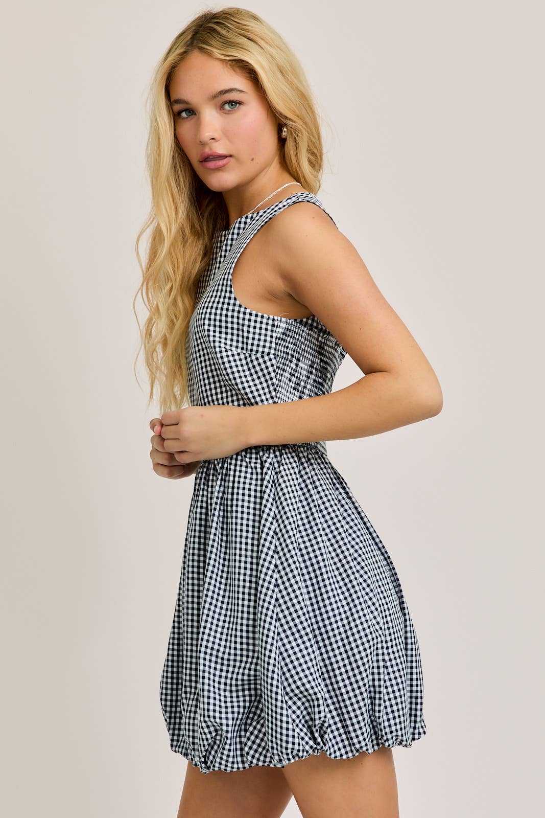 BOAT NECK SLEEVELESS BUBBLE HEM DRESS: NAVY - Rose & Olivia Boutique