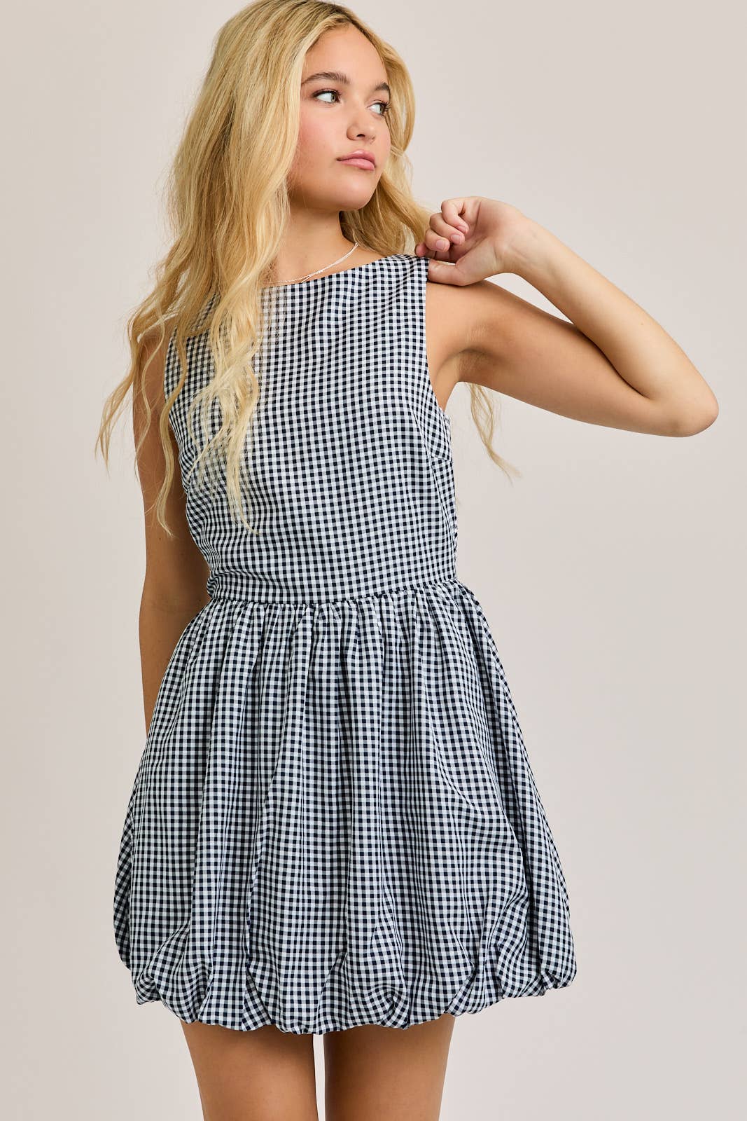BOAT NECK SLEEVELESS BUBBLE HEM DRESS: NAVY - Rose & Olivia Boutique