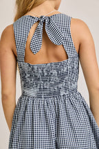 BOAT NECK SLEEVELESS BUBBLE HEM DRESS: NAVY - Rose & Olivia Boutique