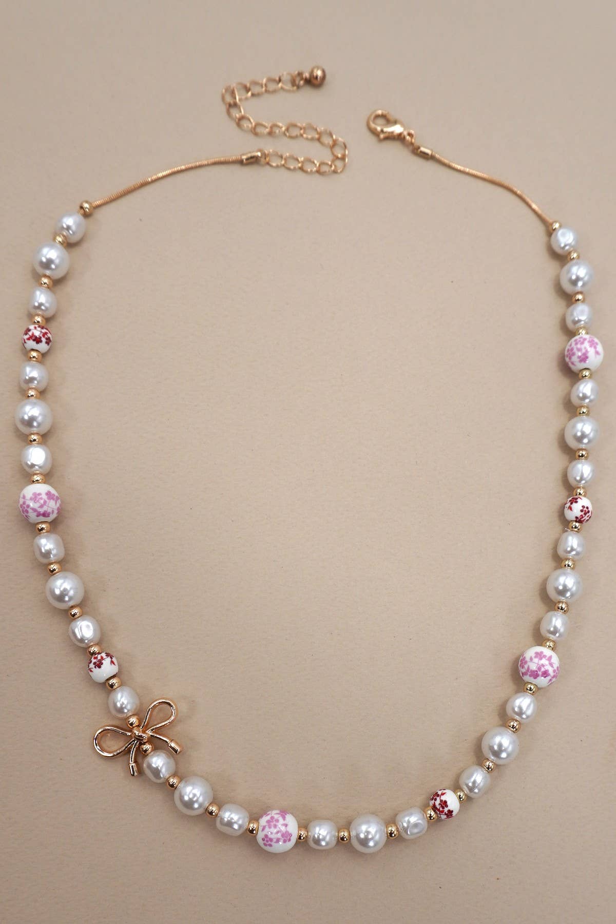 PINK CERAMIC PORCELAIN PEARL BOW NECKLACE - Rose & Olivia Boutique